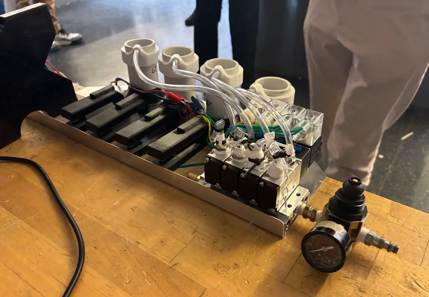 The pneumatic instrument — solenoids gating harmonically tuned PVC pipes