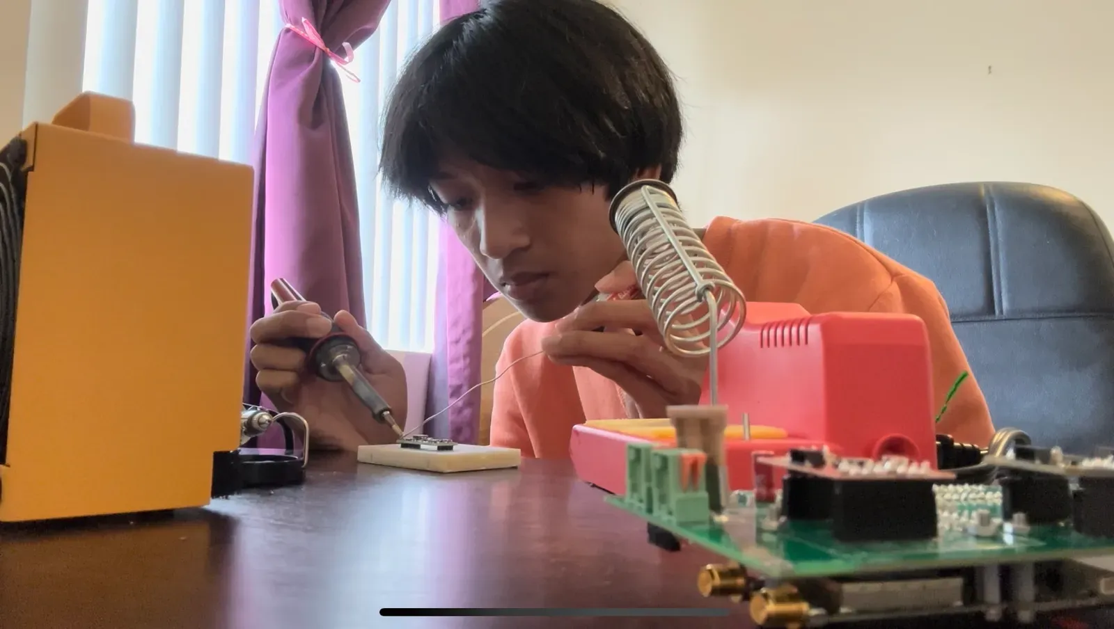 AJ soldering the sensor electronics