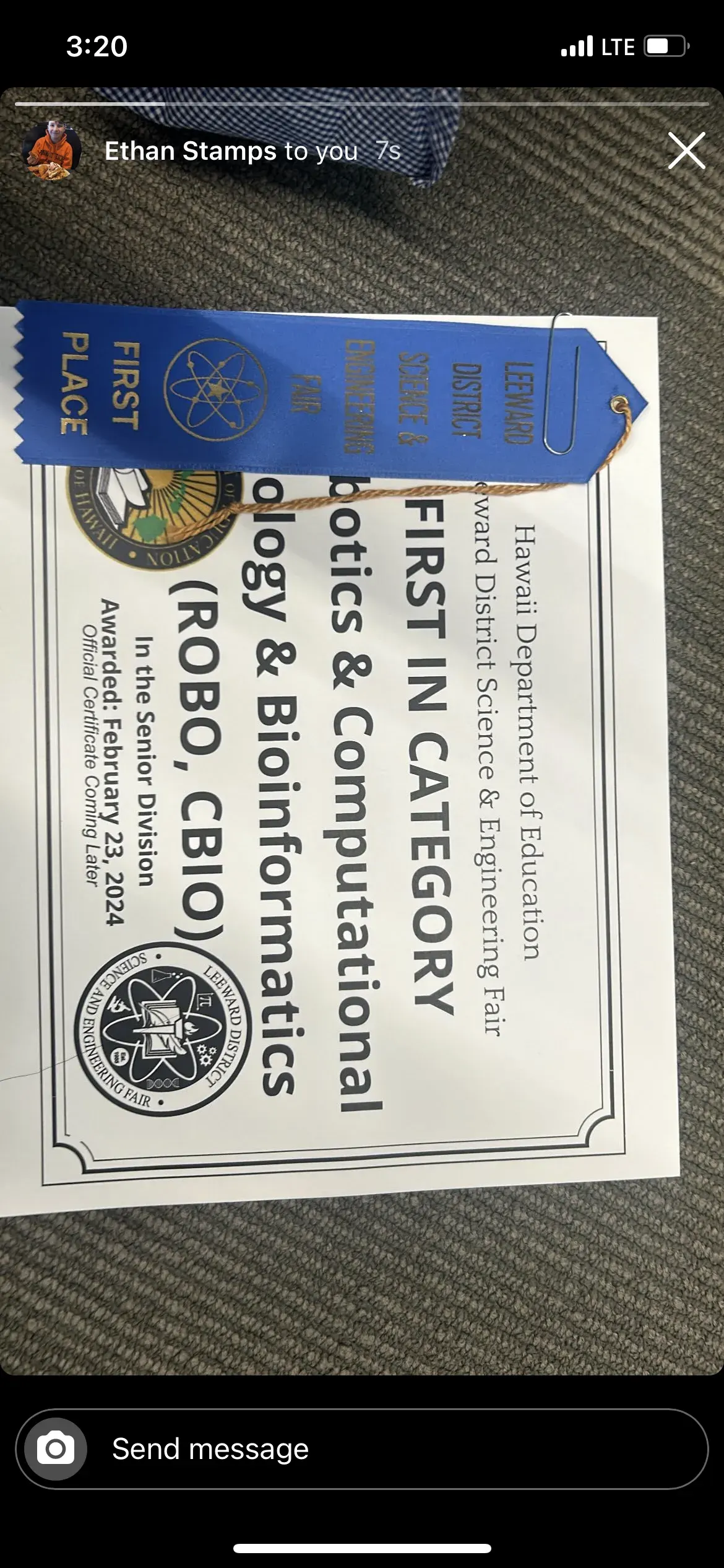 A science-fair special-award ribbon and certificate