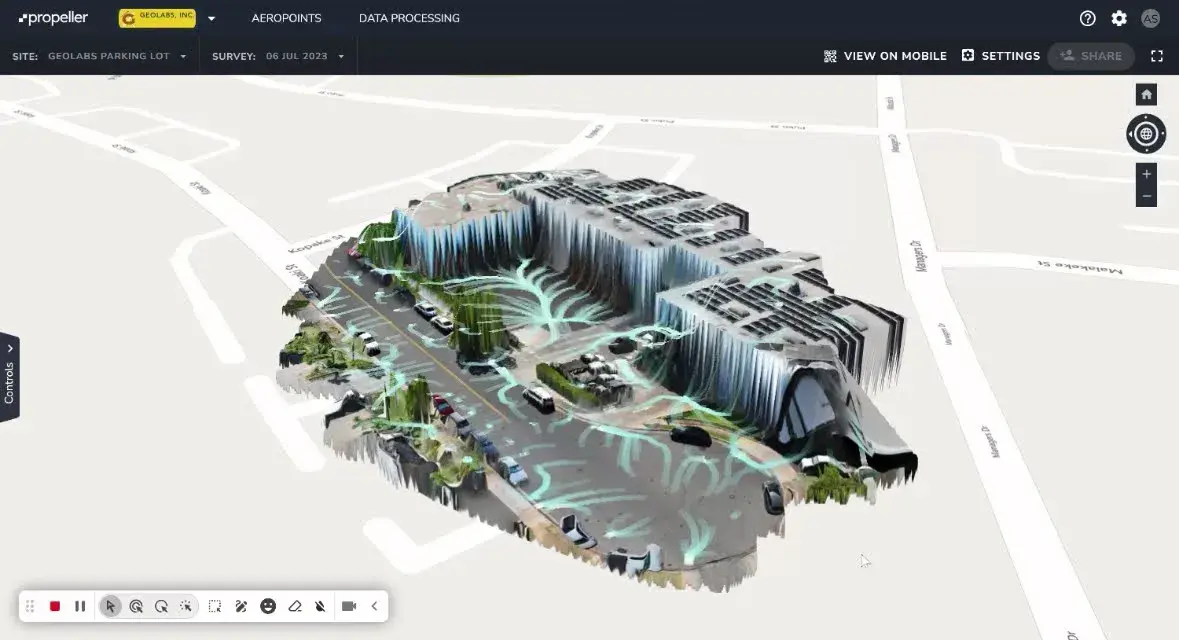 A georeferenced 3D model of the Geolabs parking lot in Propeller, with surface-runoff flow lines drawn across it