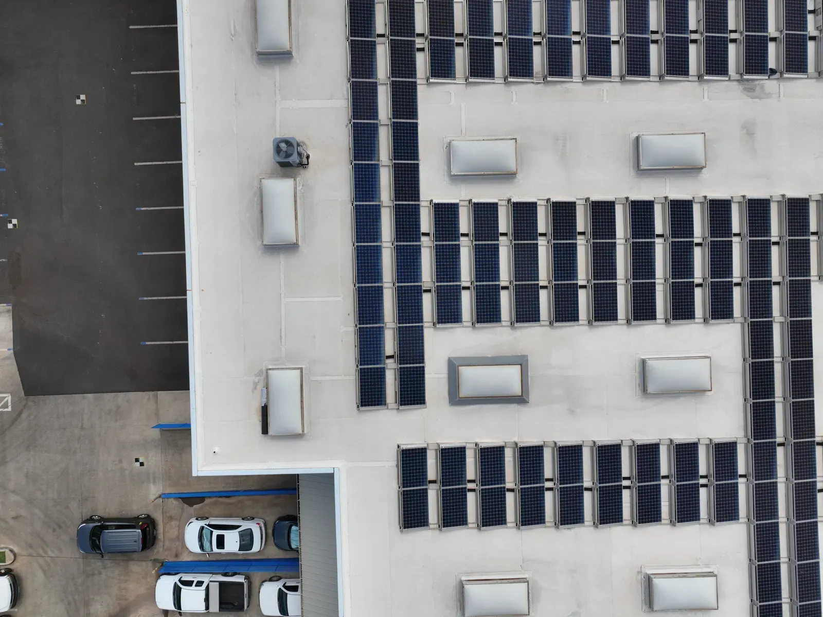 A nadir survey photo over the site's roof and parking lot