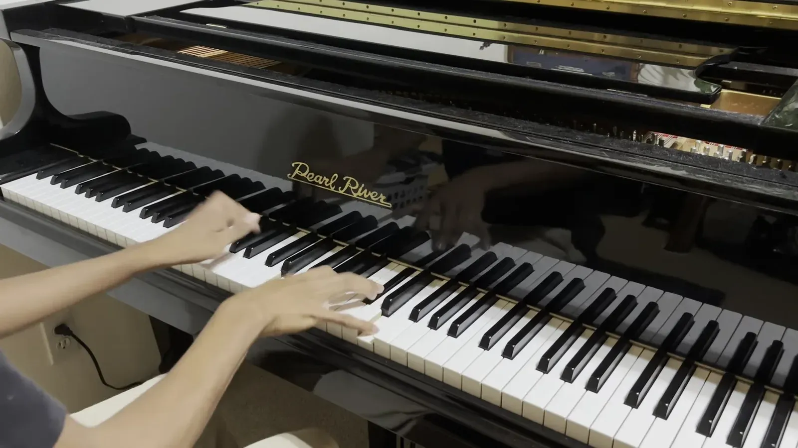 AJ playing the piano